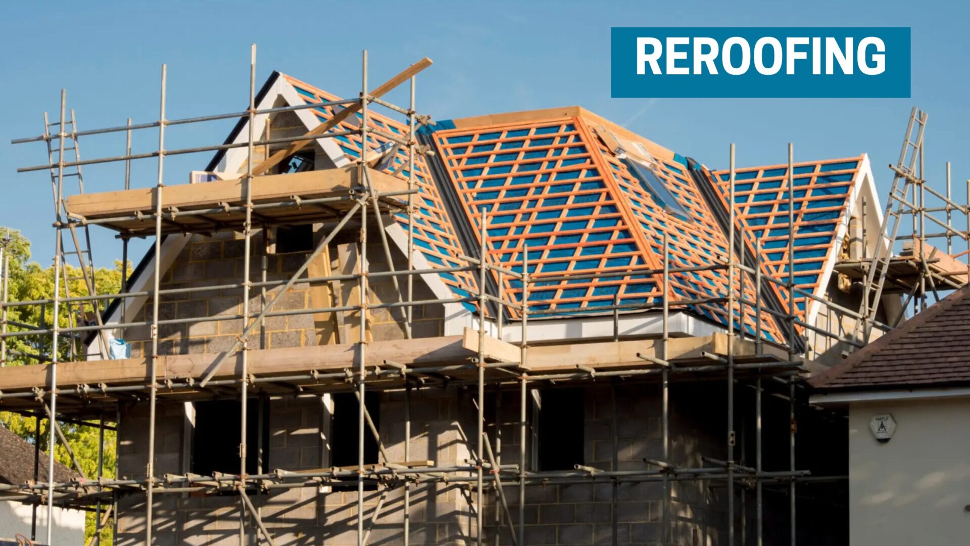 A newly reroofed house with solar panels being installed